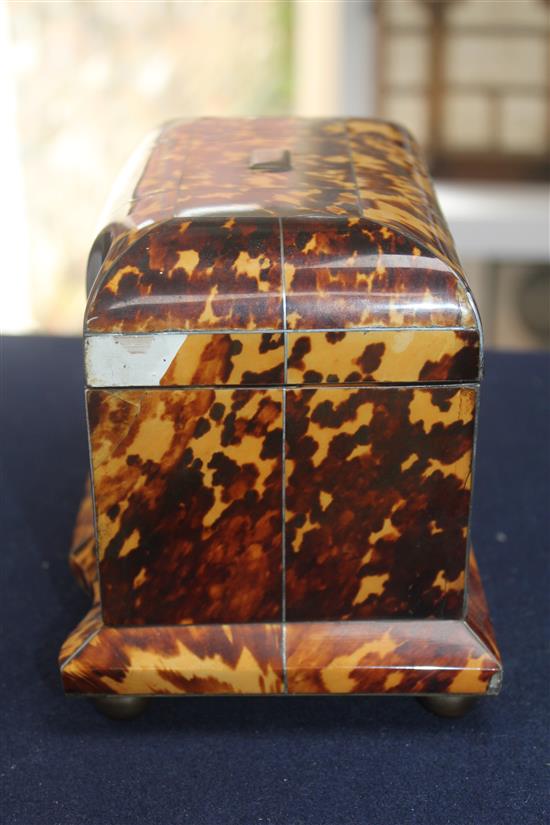 A 19th century tortoiseshell two division tea caddy, 7.75in.